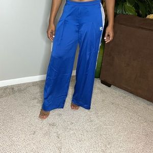 Adidas wide legged limited edition trousers.
